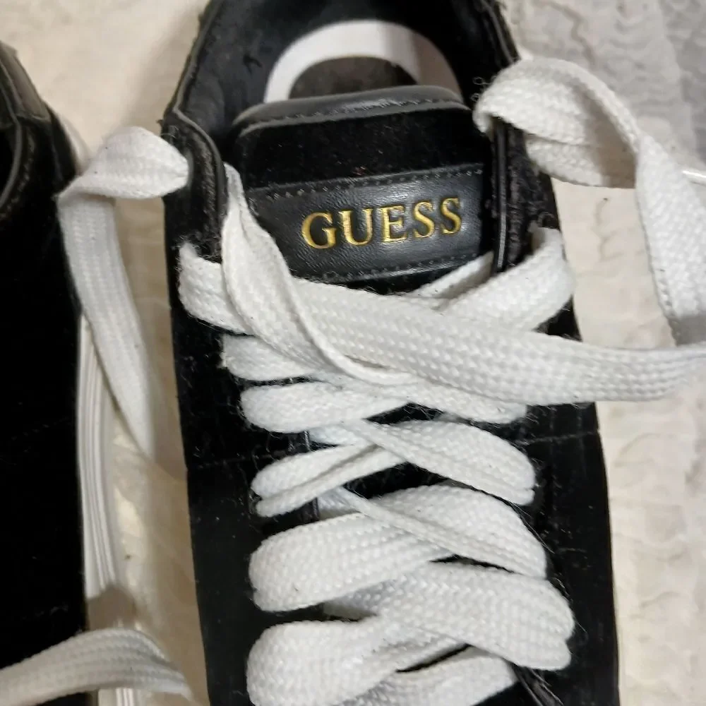 Guess black faux